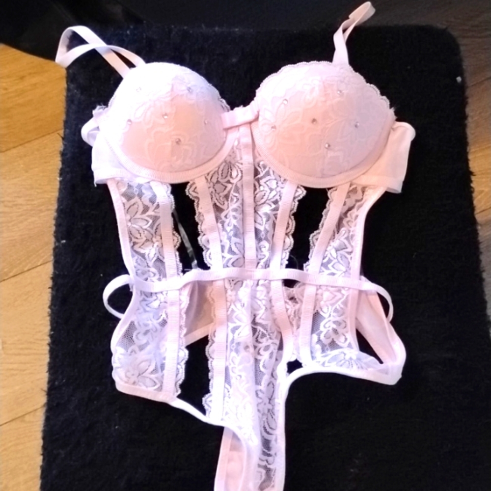 Unworn light pink with rhinestones strappy bodysuit